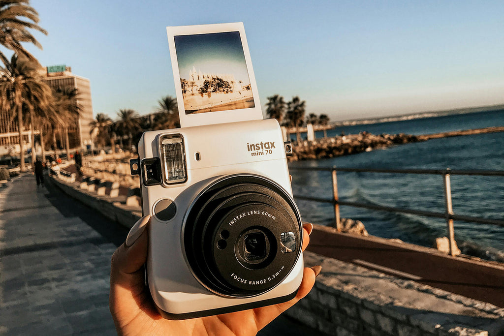Say Cheese and Cherish: Embracing the Joy of Instant Cameras and Film